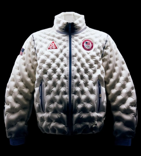 Nike has long embraced air in footwear, but the Oregon-based brand is now taking it to apparel. The new A.I.R. (adapt, inflate, regulate) Technology will be worn by Team USA athletes in Milan in winter 2026. The jacket features the ability for athletes to regulate temperature in real time without changing layers by inflating or deflating air within the jacket’s baffles, offering warmth levels from a lightweight hoodie to a mid-weight puffer. 